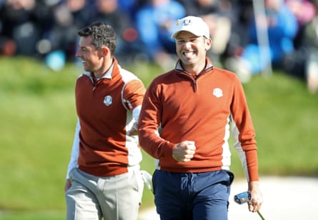 Rory McIlroy and Sergio García celebrate a birdie in the Ryder Cup fourballs in 2018.